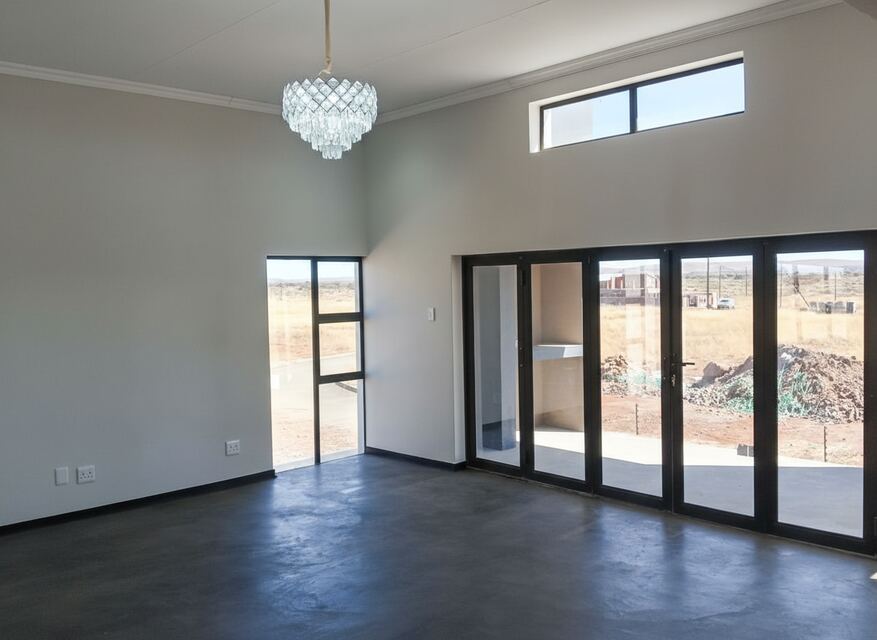 Open-plan living with chandelier