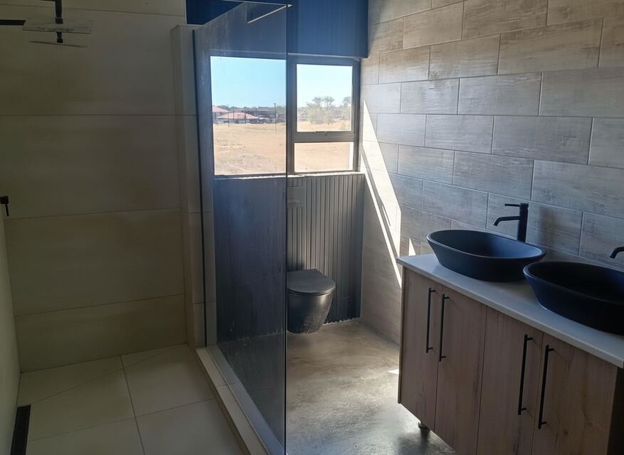 Master bathroom with black fixtures
