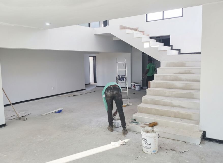 Crew painting the staircase